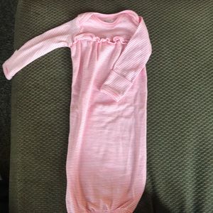 Never worn. Carter’s sleep gown. Size: NB.